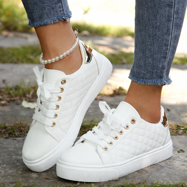 White quilted lace-up sneakers with gold heel detail