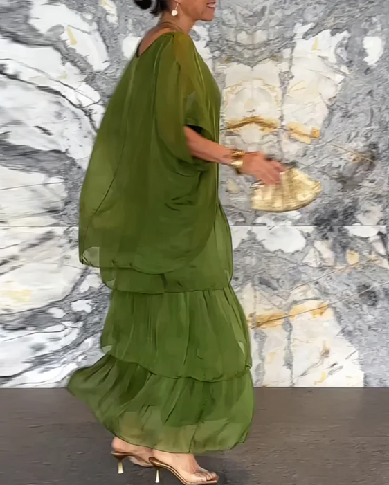 Side draped green maxi with plain layered ruffle skirt