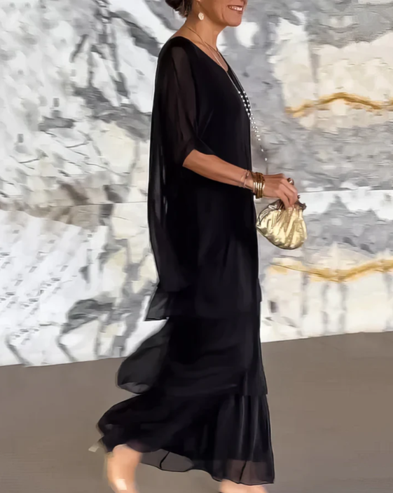 Side view of black flowy maxi dress style