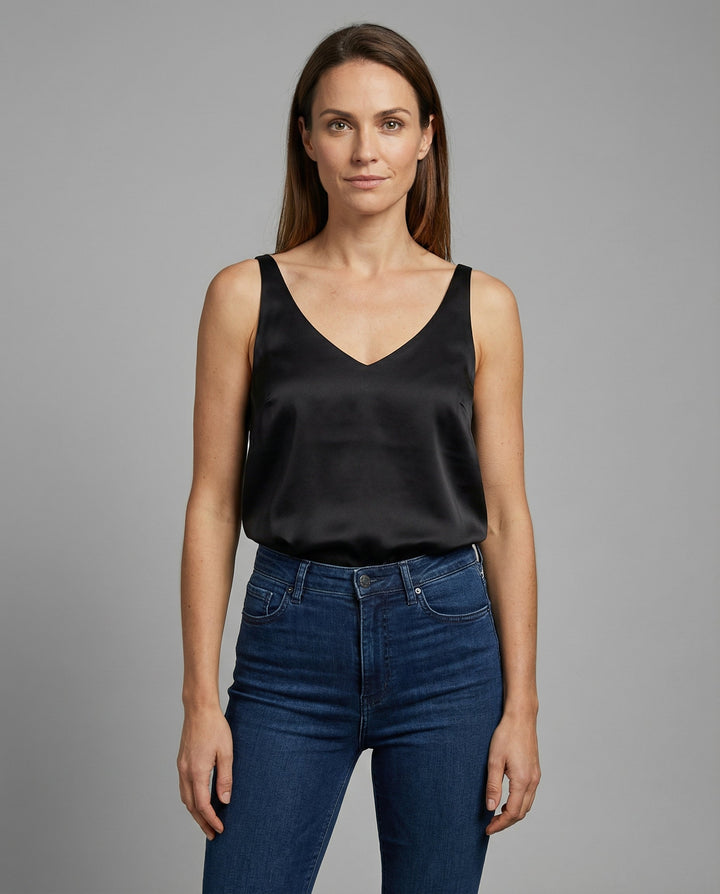 Female model wearing a lightweight casual top against a plain background.