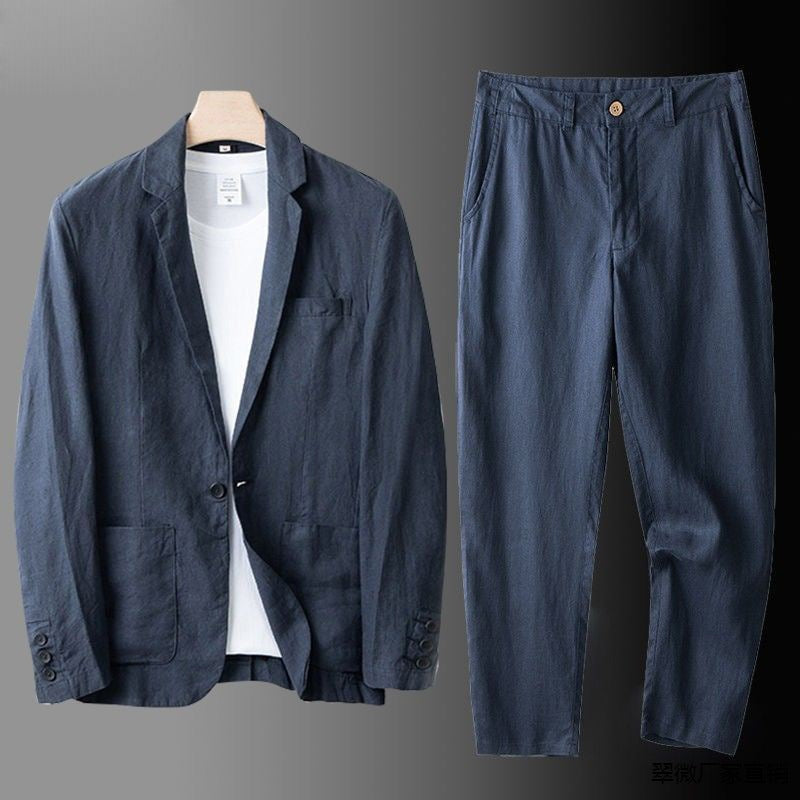  Man presenting a smart-casual linen outfit on a plain background.