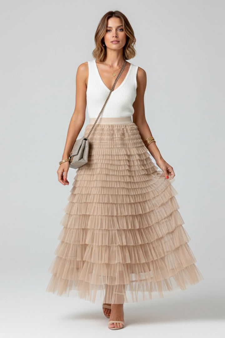 Model wearing layered tulle midi skirt front view