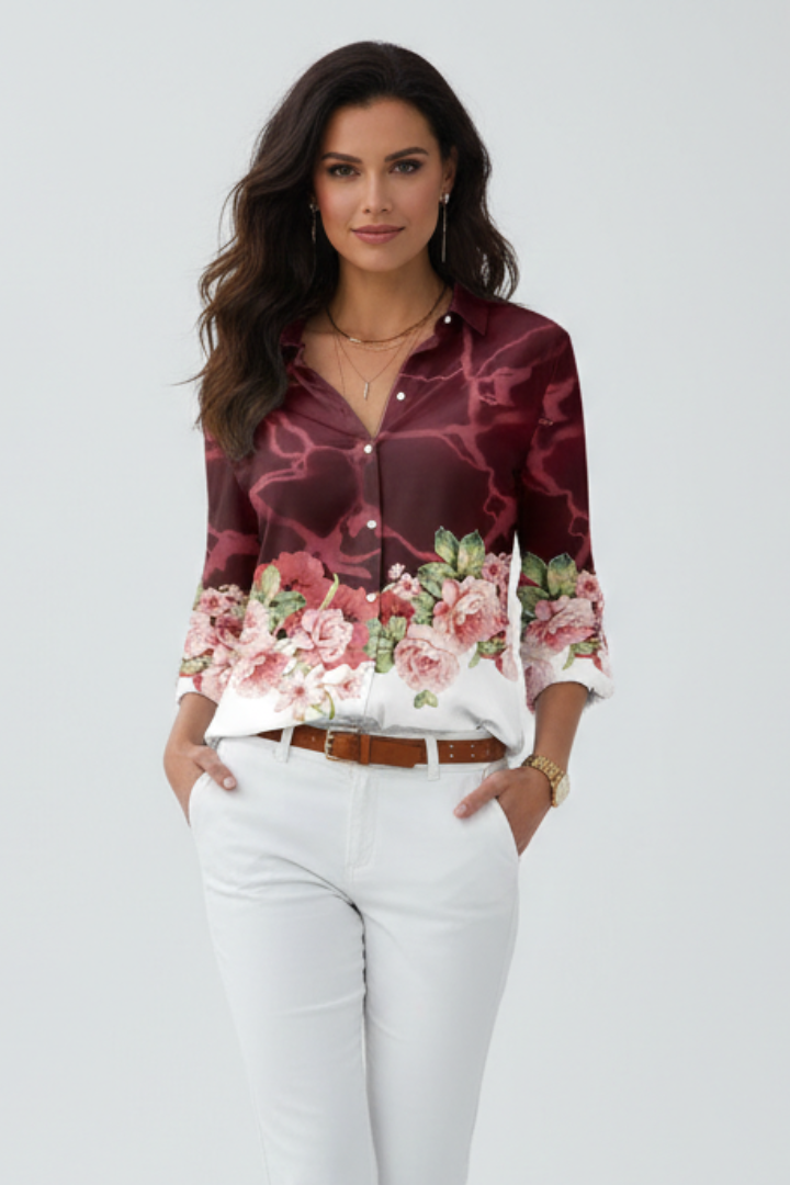 Button-up floral blouse in clean white background