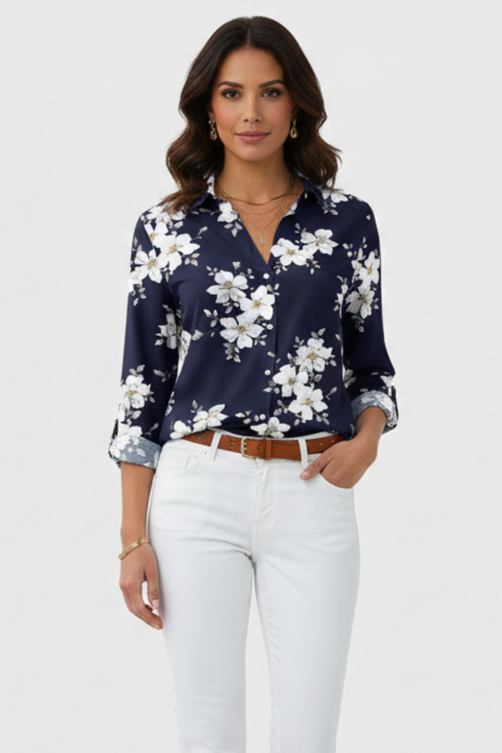 Front-facing navy blouse with soft floral border