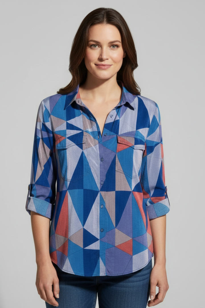 Front view blue geometric blouse on plain light grey background