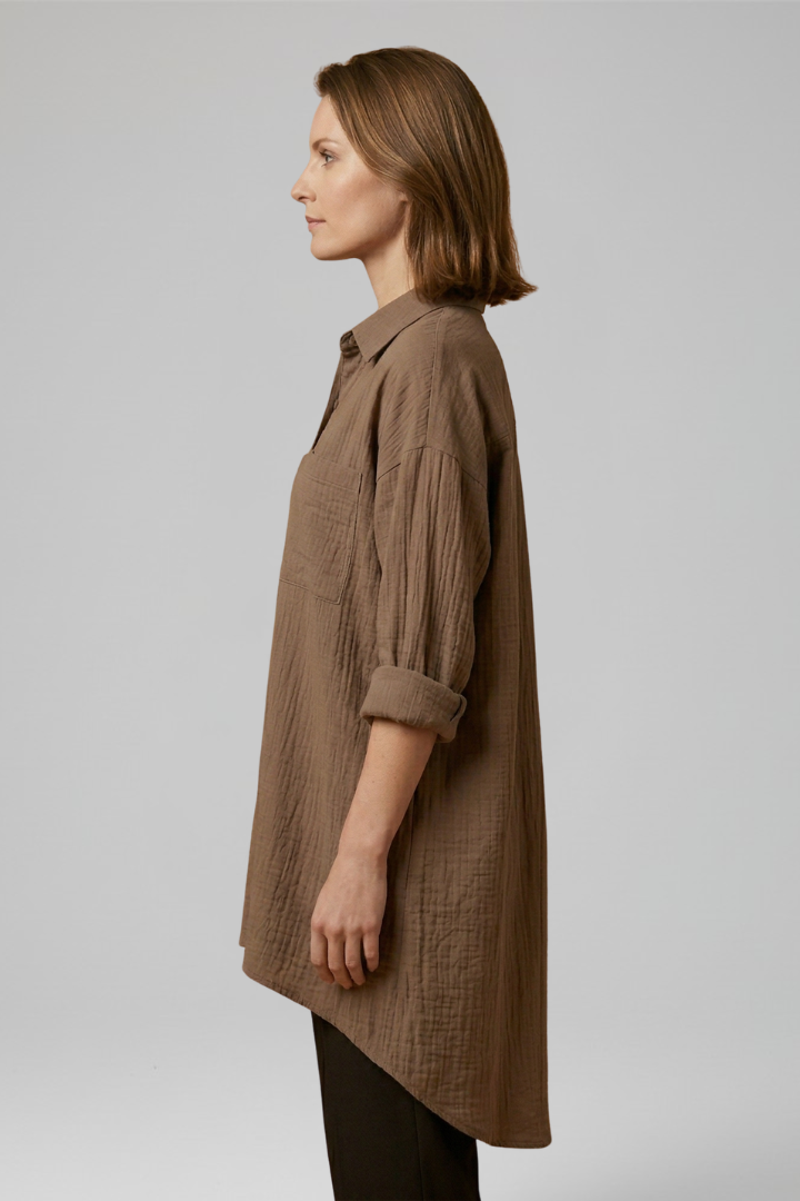 Side view fastening blouse with clean woven fabric texture