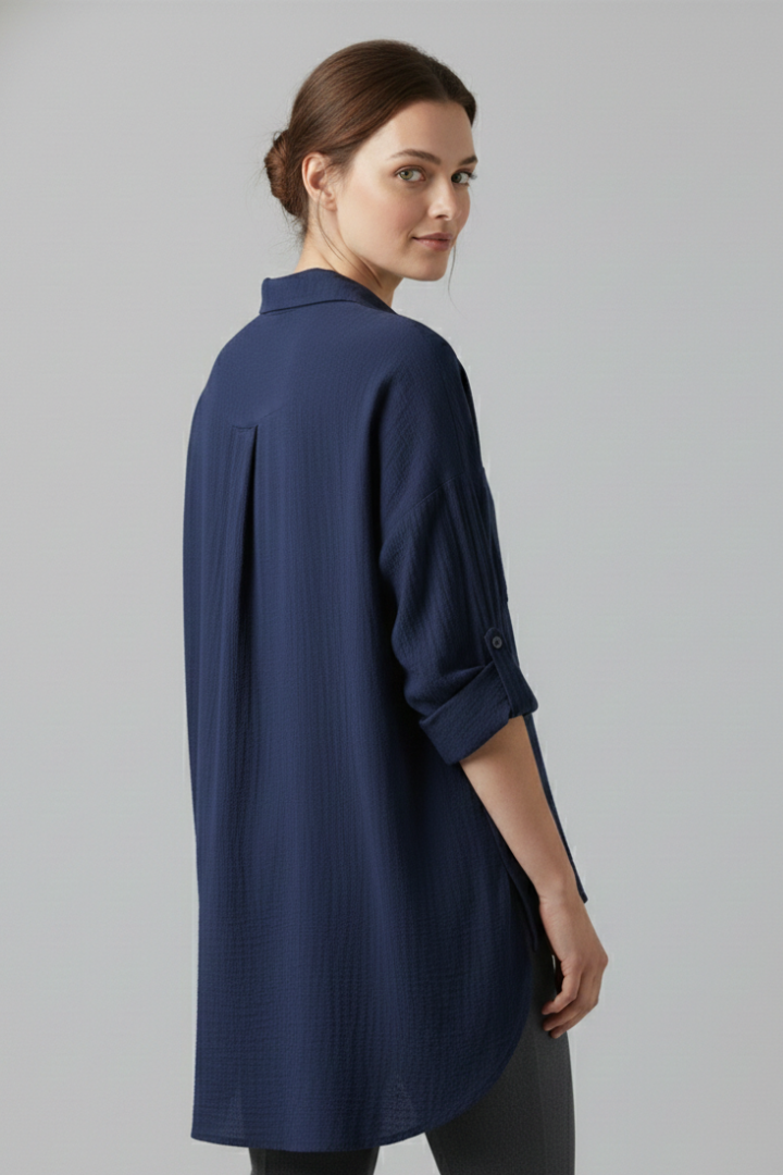 Longer back hem women’s blouse back angle view