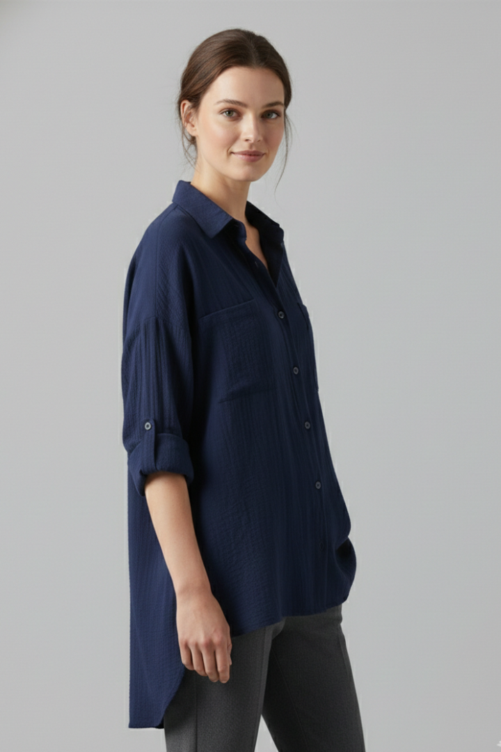 Side angle women’s woven blouse with curved hem