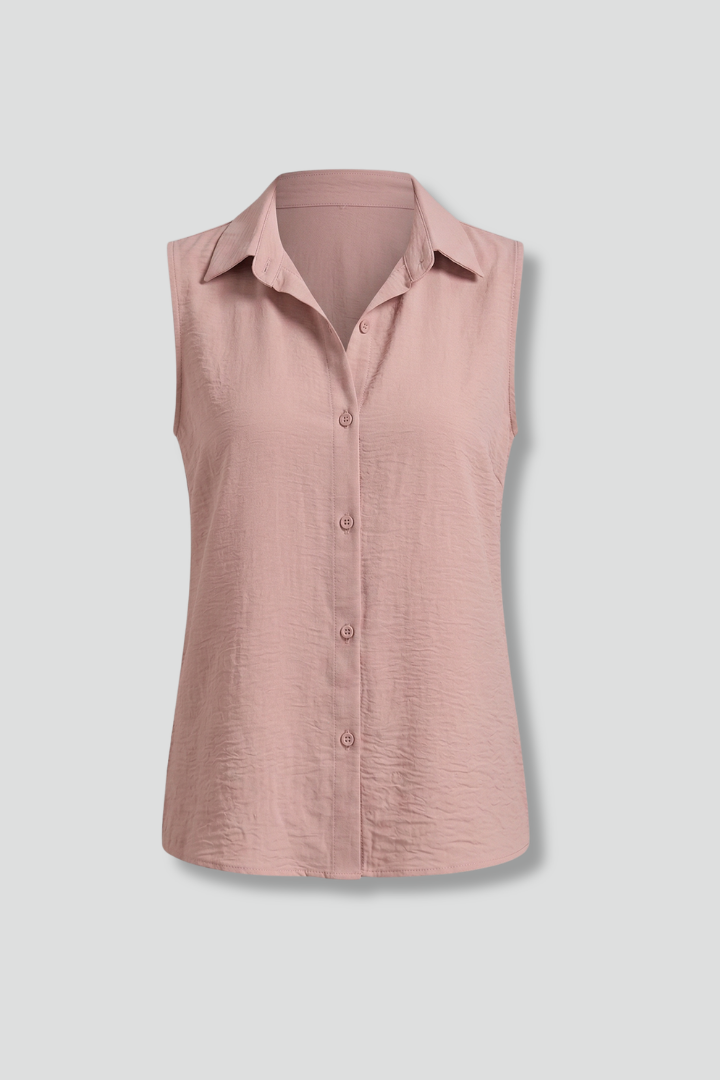 Button-down sleeveless women’s top against gray background