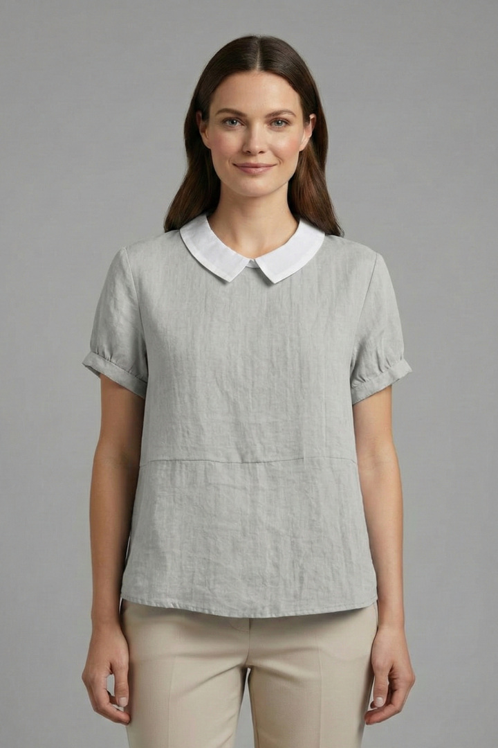 Woman pullover blouse on gray background