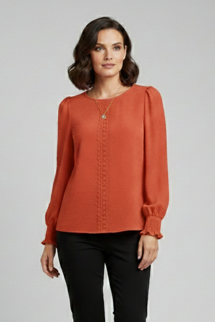 Ladies embroidered top studio gray backdrop