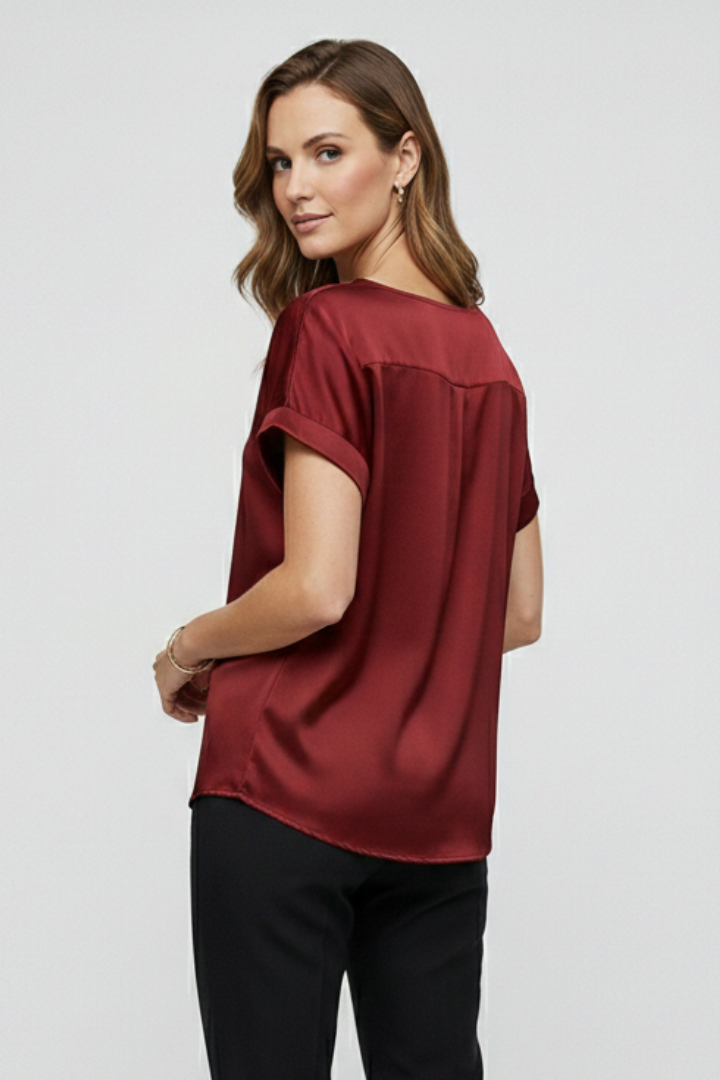 Glossy maroon short sleeve top back angle pose