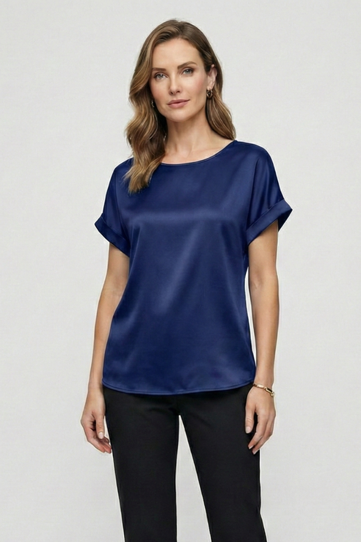 Luxe satin blue blouse displayed on standing model