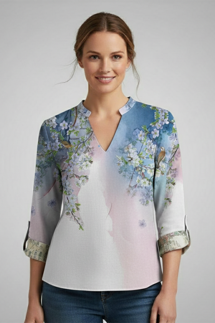 Bright multitone blouse styled with fitted denim jeans