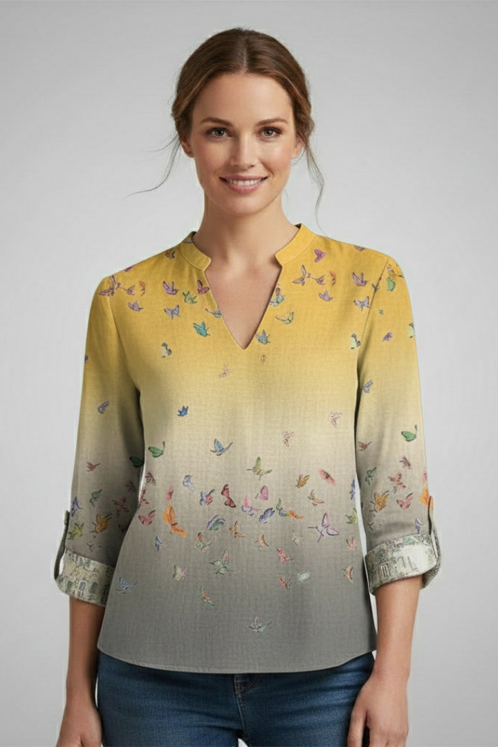 Fashion model wearing relaxed fit printed everyday yellow blouse