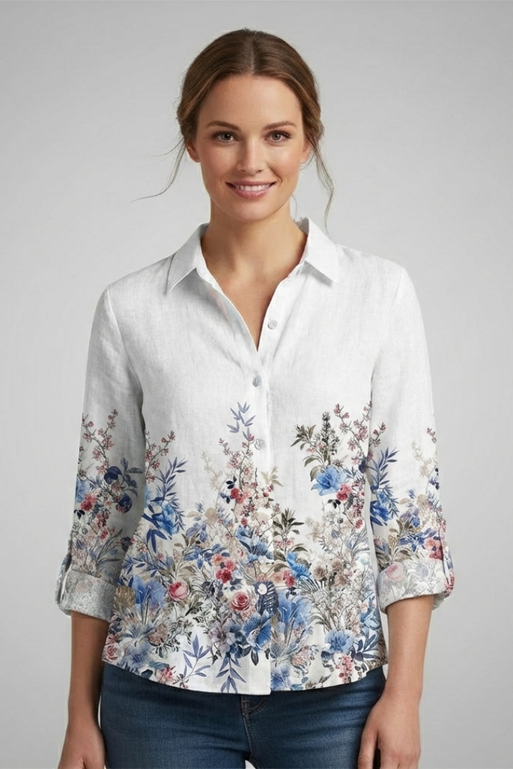 Trendy patterned white top displayed against plain light background