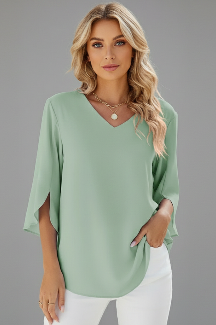 Relaxed office green top front profile on grey background