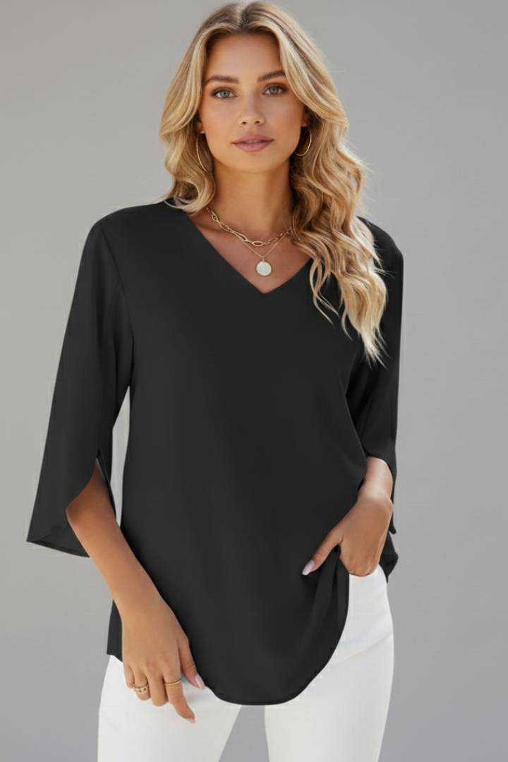 Front product photo of women’s black short sleeve blouse