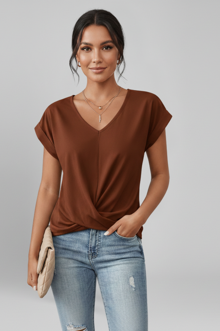 Model in blouse and jeans front view 