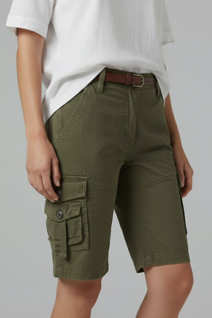 Female model wearing mid-thigh shorts front angle gray