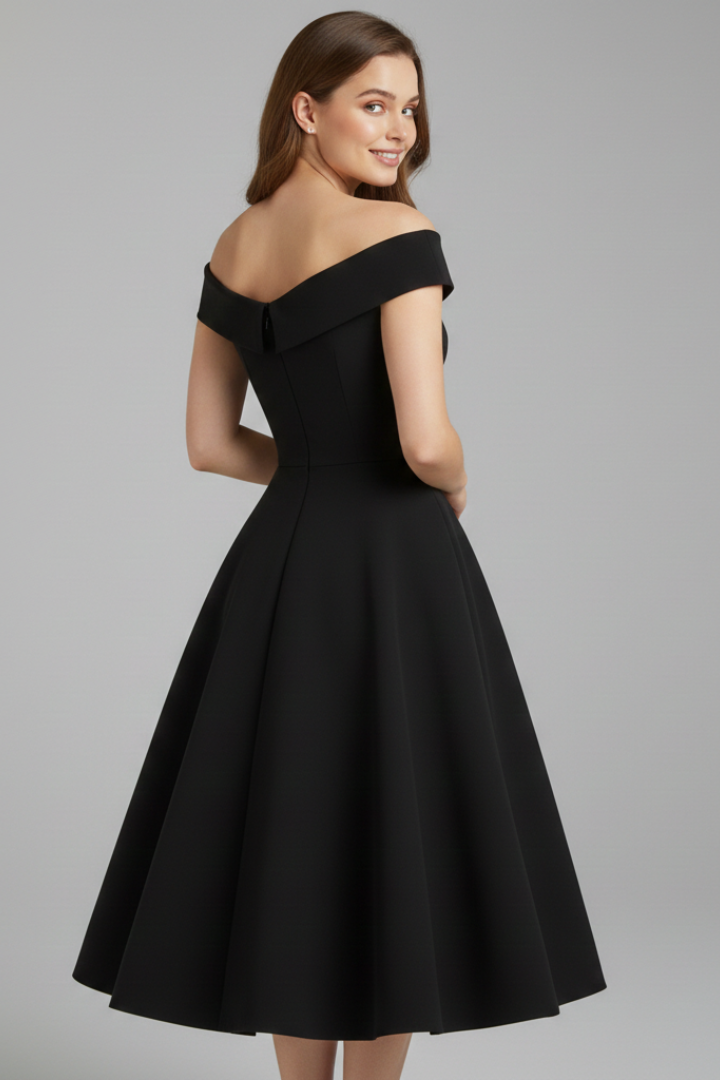 Back angle shaped bodice midi dress studio shot gray background