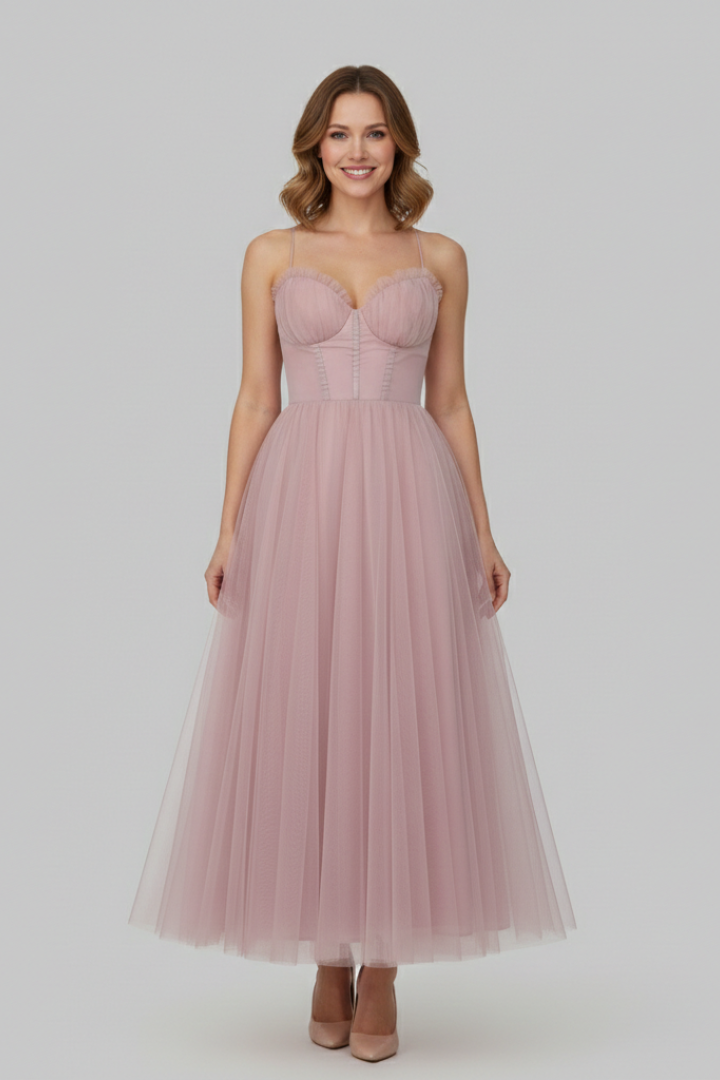Smiling female model weaing strapless midi dress front view on gray background