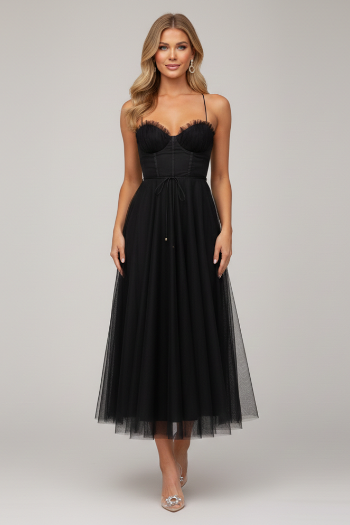 Voluminous tulle skirt black dress front gray background