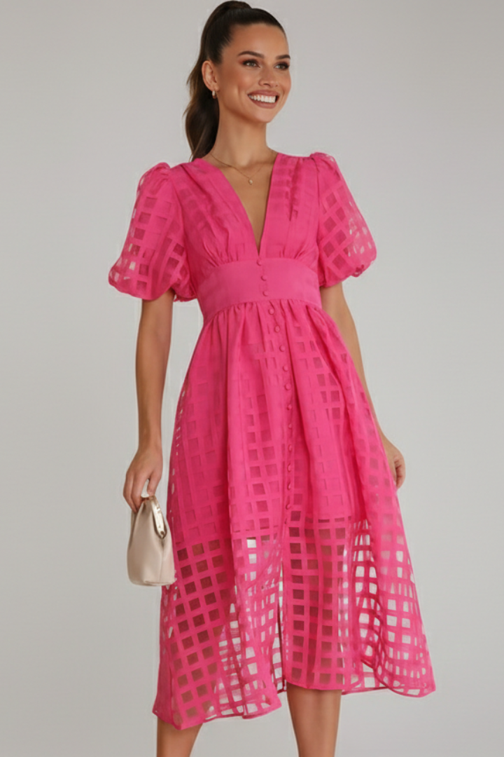 Model wearing lace midi pink dress front view gray