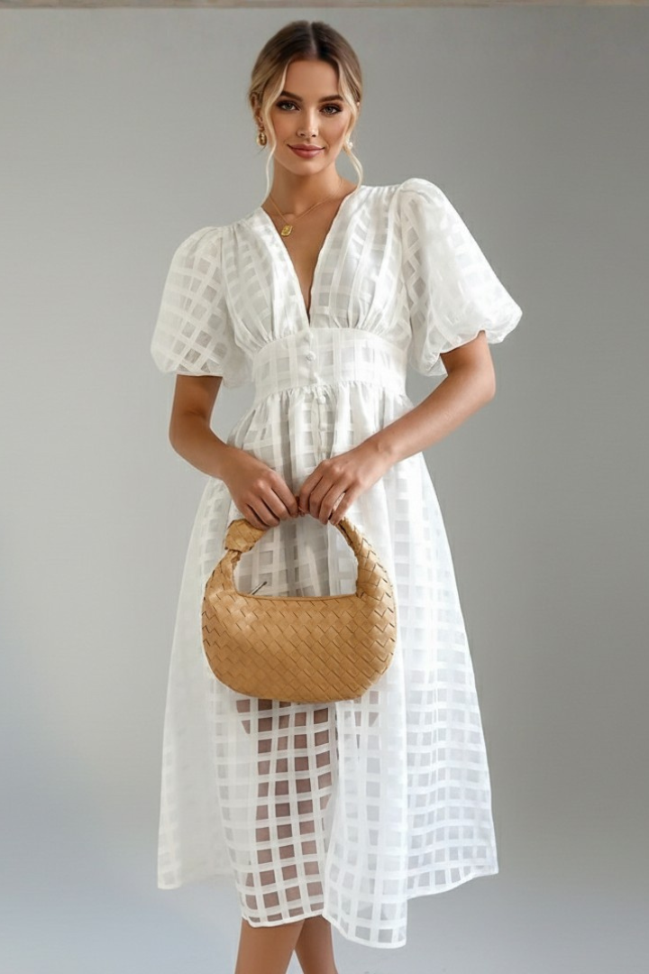 Model showing waist detail white dress gray background