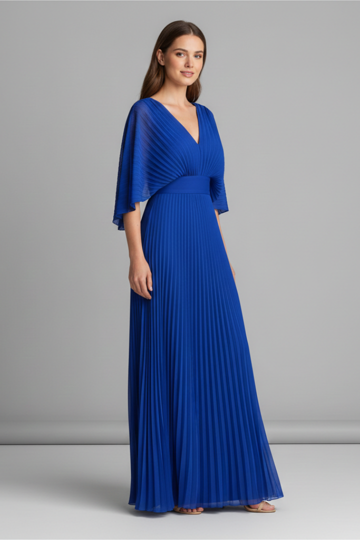 Woman model wearing a sleek skirt with a smooth finish on a plain background.