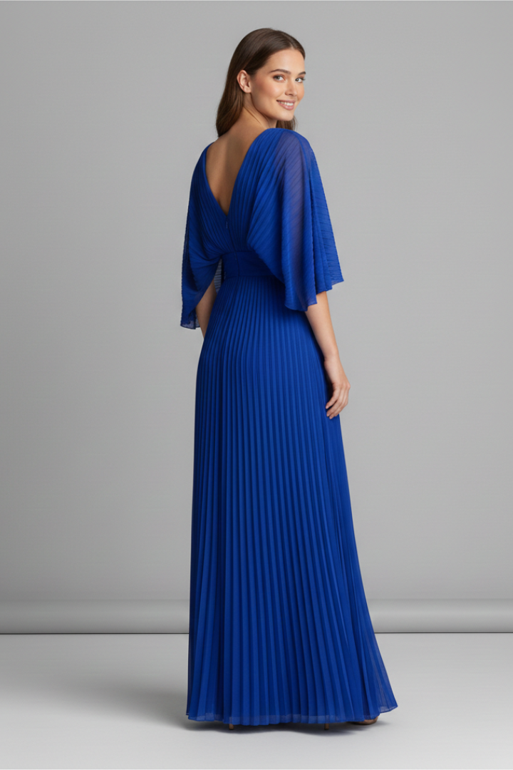 Back view model in flowing maxi dress