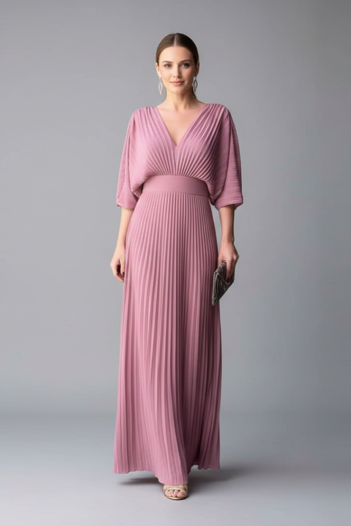 Woman model in a streamlined skirt outfit shown against a plain background.