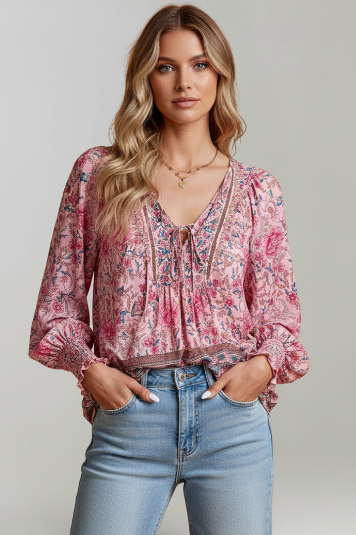 Pink floral blouse front view on model