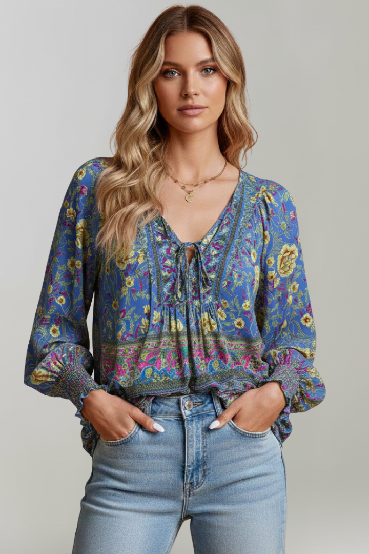 Smocked cuff blue floral blouse front product photo