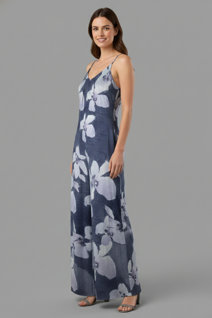 Female model in a matching wrap top and wide-leg pants set displayed on a plain background.