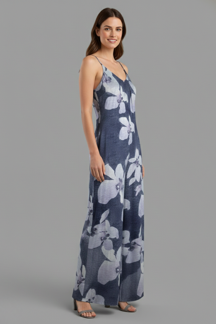 Woman wearing a casual two-piece set with short sleeves and elastic waist pants on a plain background.