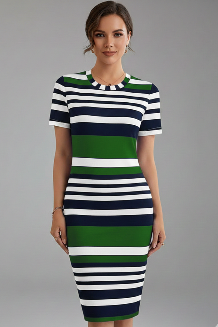 Female model front view showcasing striped casual dress on gray.