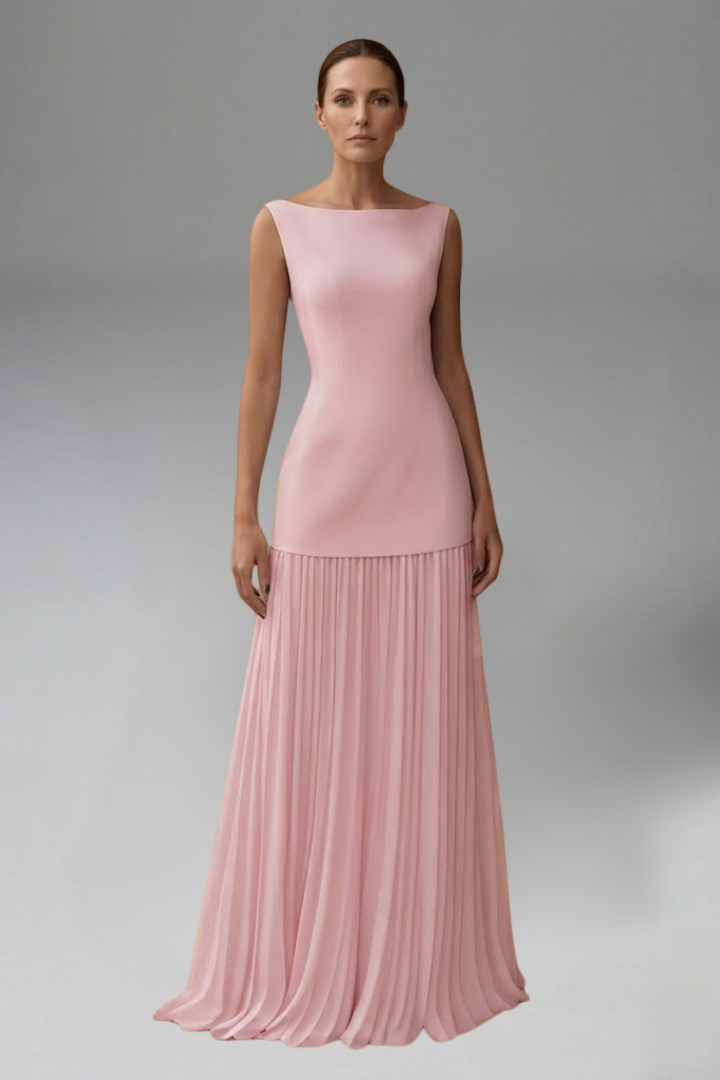 Model front pose in elegant mesh pink skirt