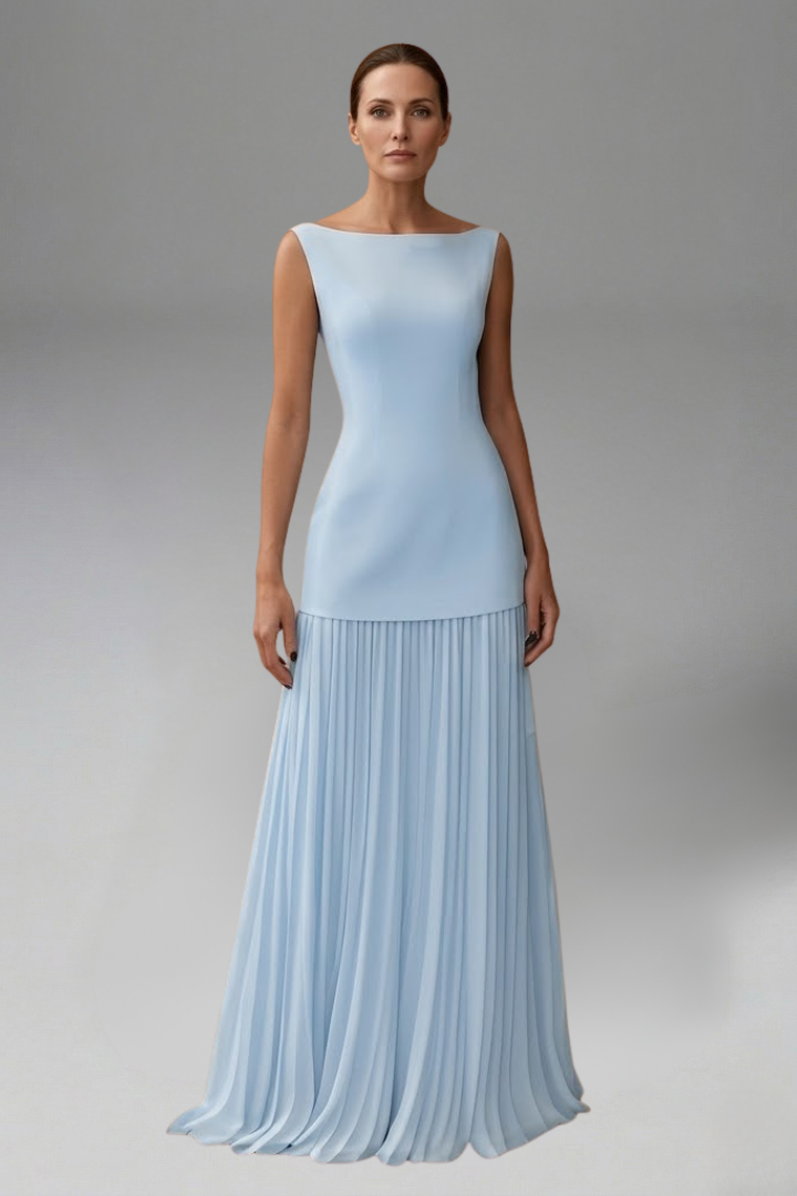 Model wearing layered tulle midi skirt front view, gray background