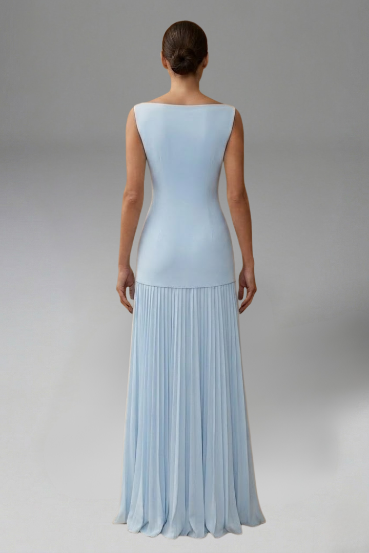 Model wearing dressy tulle skir in plain background
