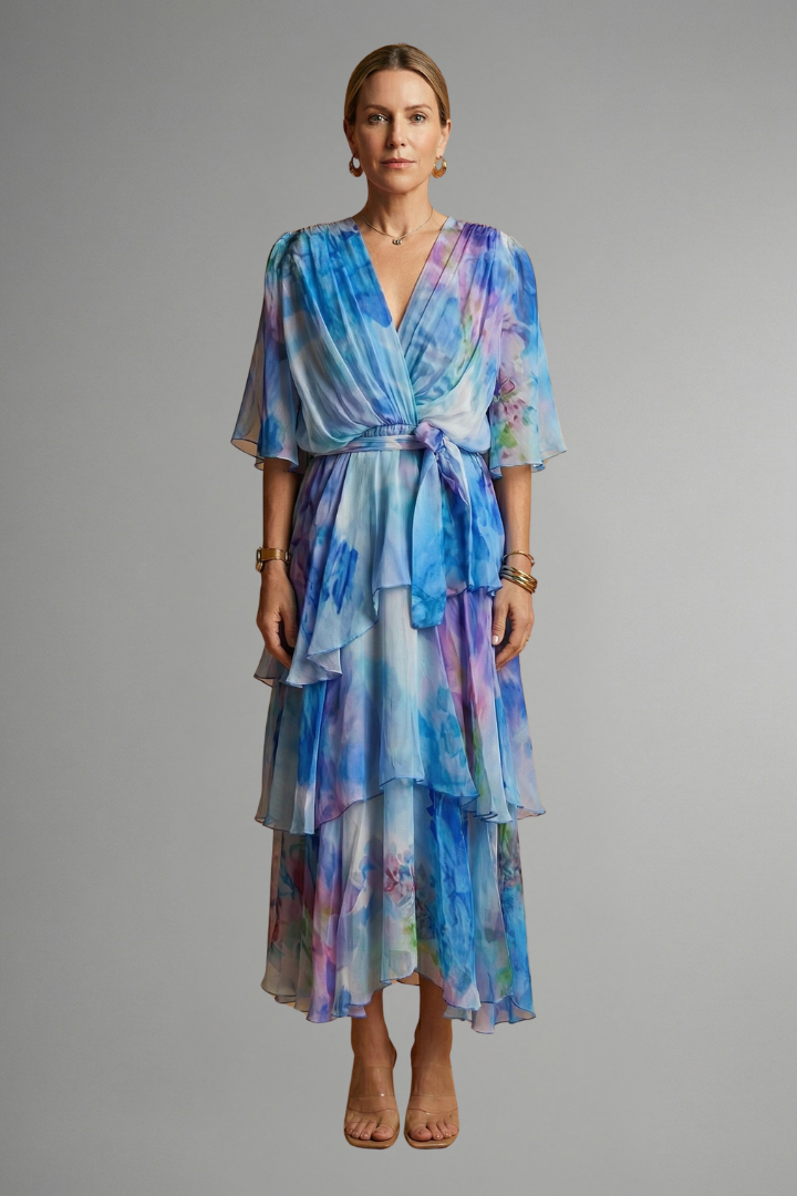 Front pose model in full length printed blue dress