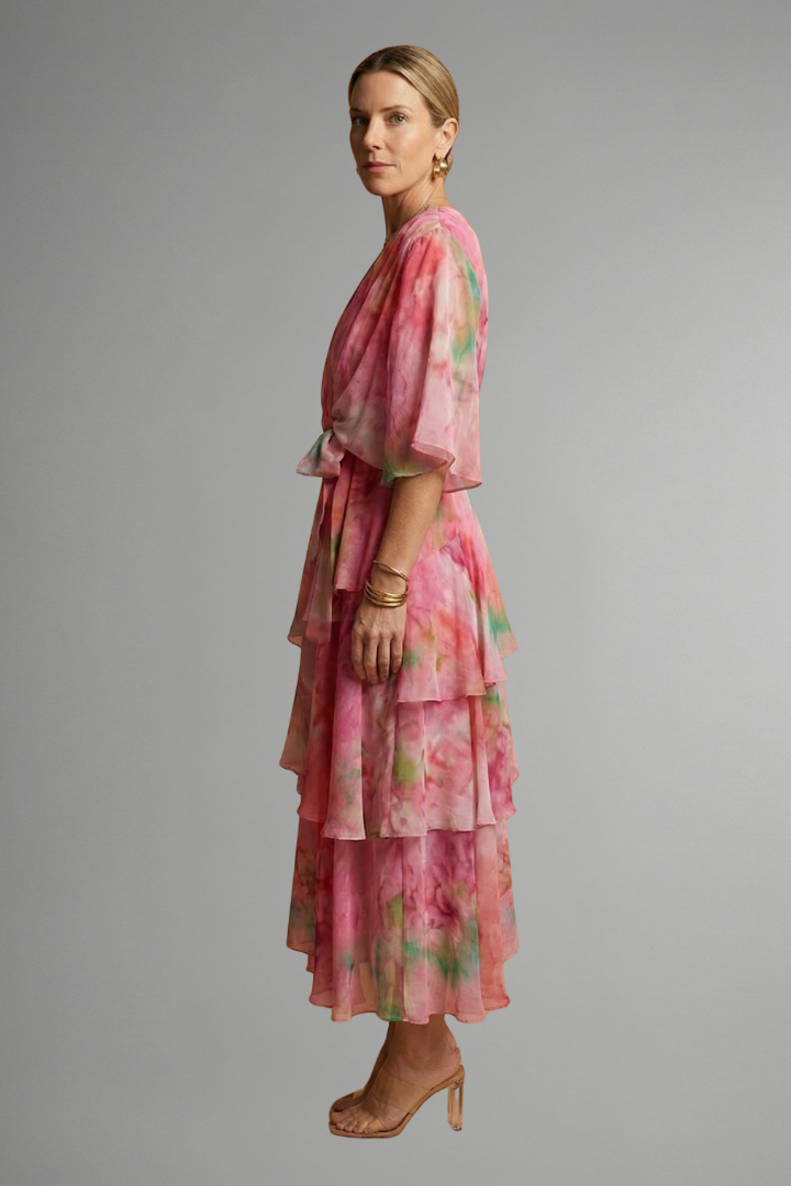 Side view of flowing printed dress with model