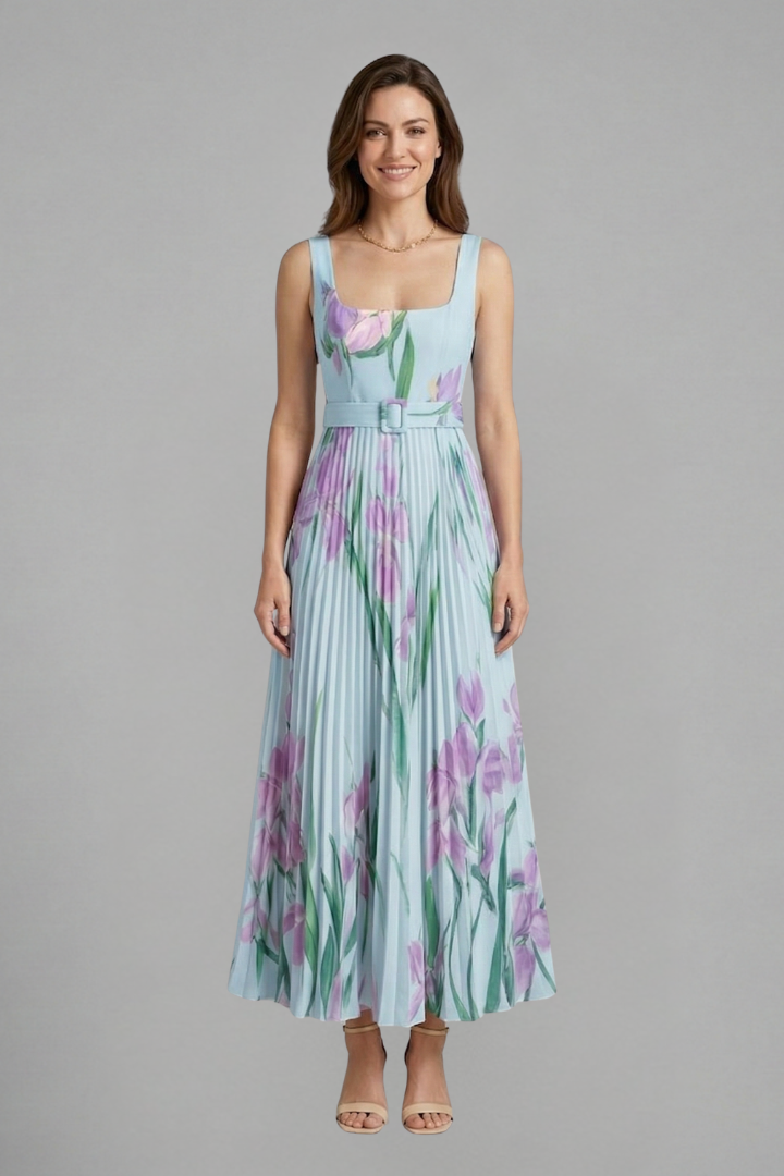 Female model standing front floral textured dress gray background