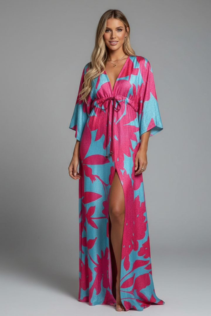 Female model front pose in stylish batwing sleeve dress.