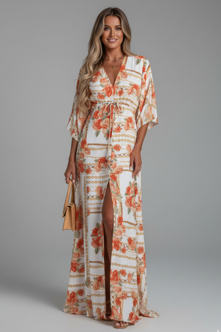 Female model wearing belted printed dress with wide sleeves.