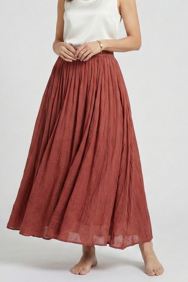 Model front-facing pose in pull-on skirt gray-background