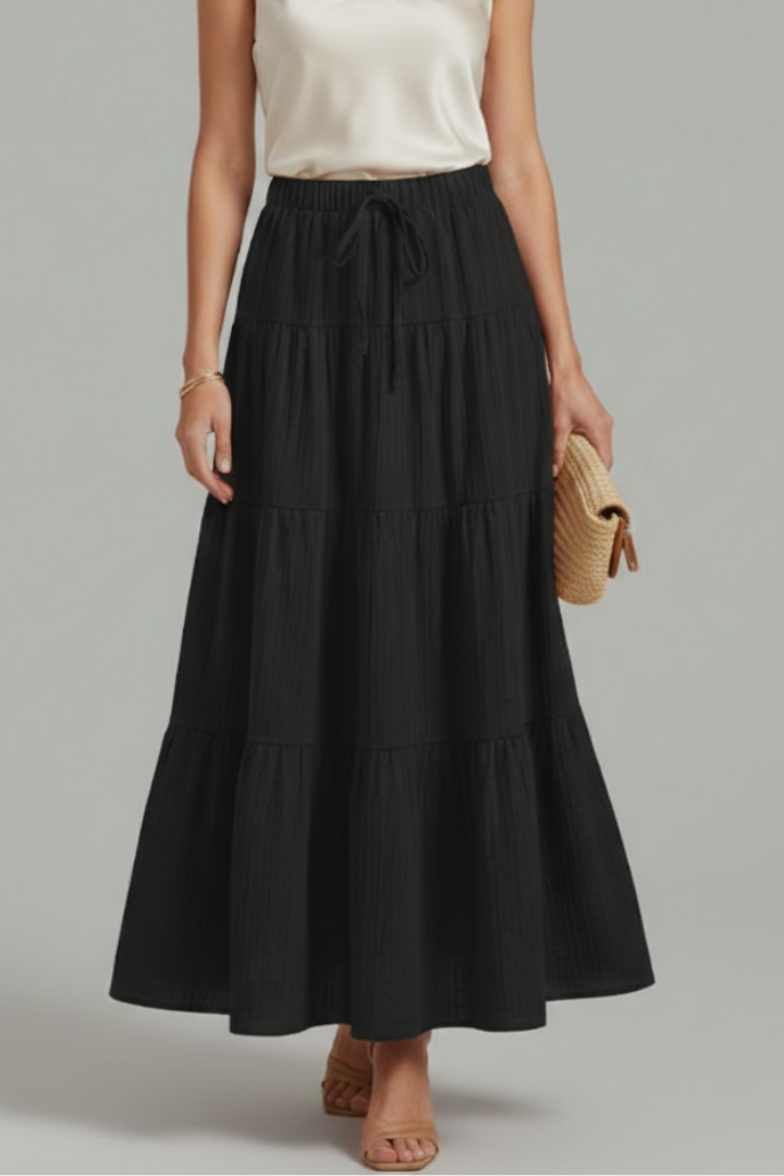Tiered maxi skirt displayed on standing model