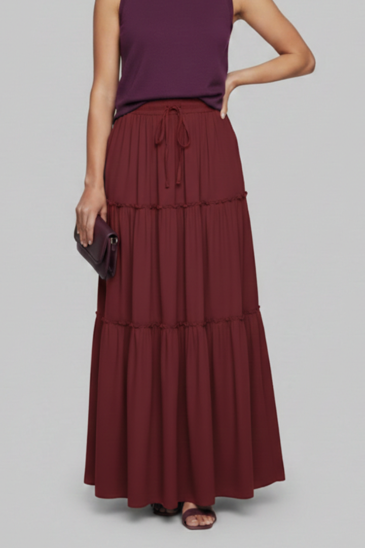 Model in modest floor length skirt front view