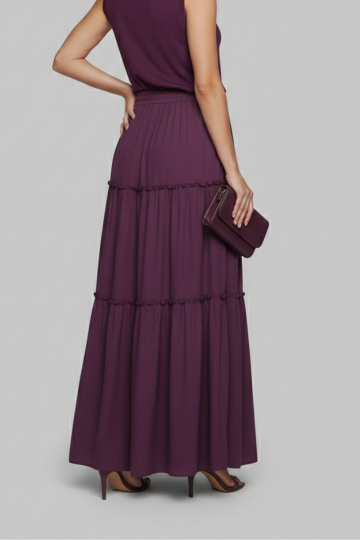 Back view model wearing layered maxi skirt gray