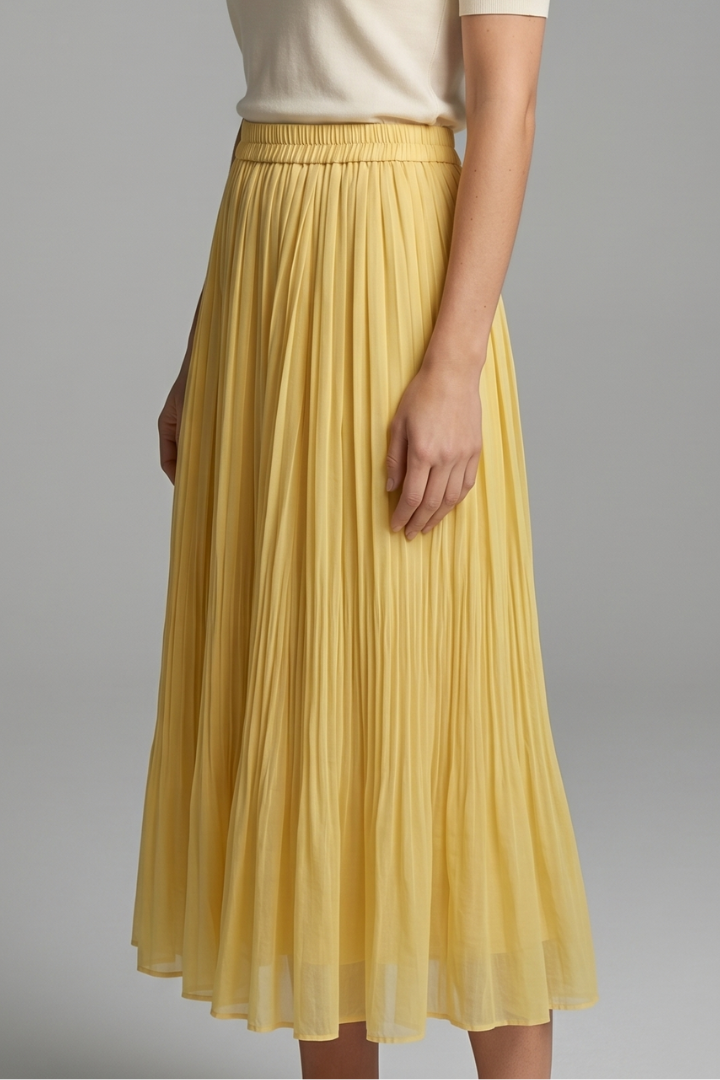 Female model styling a wide-cut long skirt with stretch waistband on a plain background.